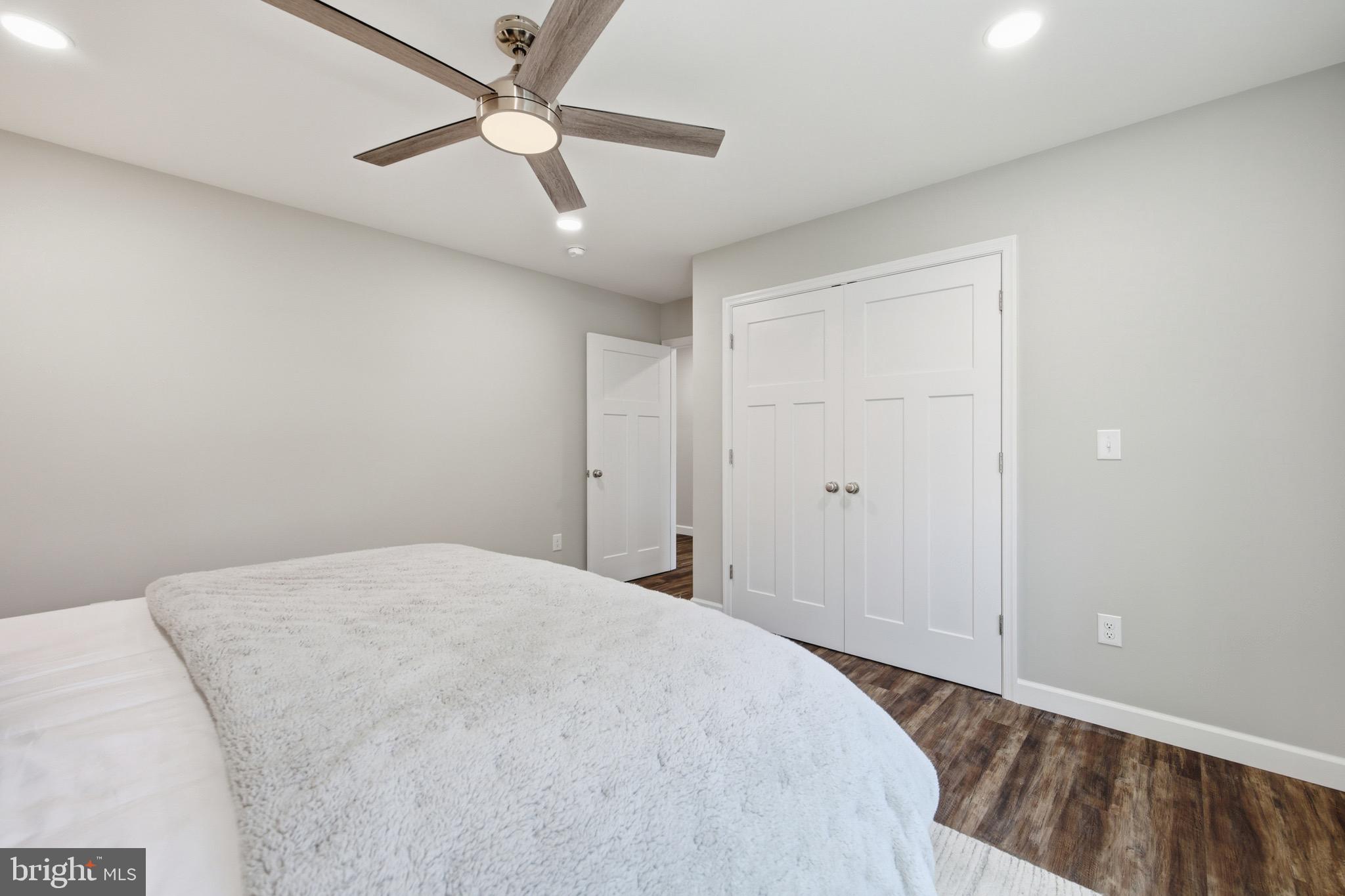 395 Deloris Road Mount Jackson, VA 22842 - Photo 27 of 48 a bedroom with a bed and a ceiling fan