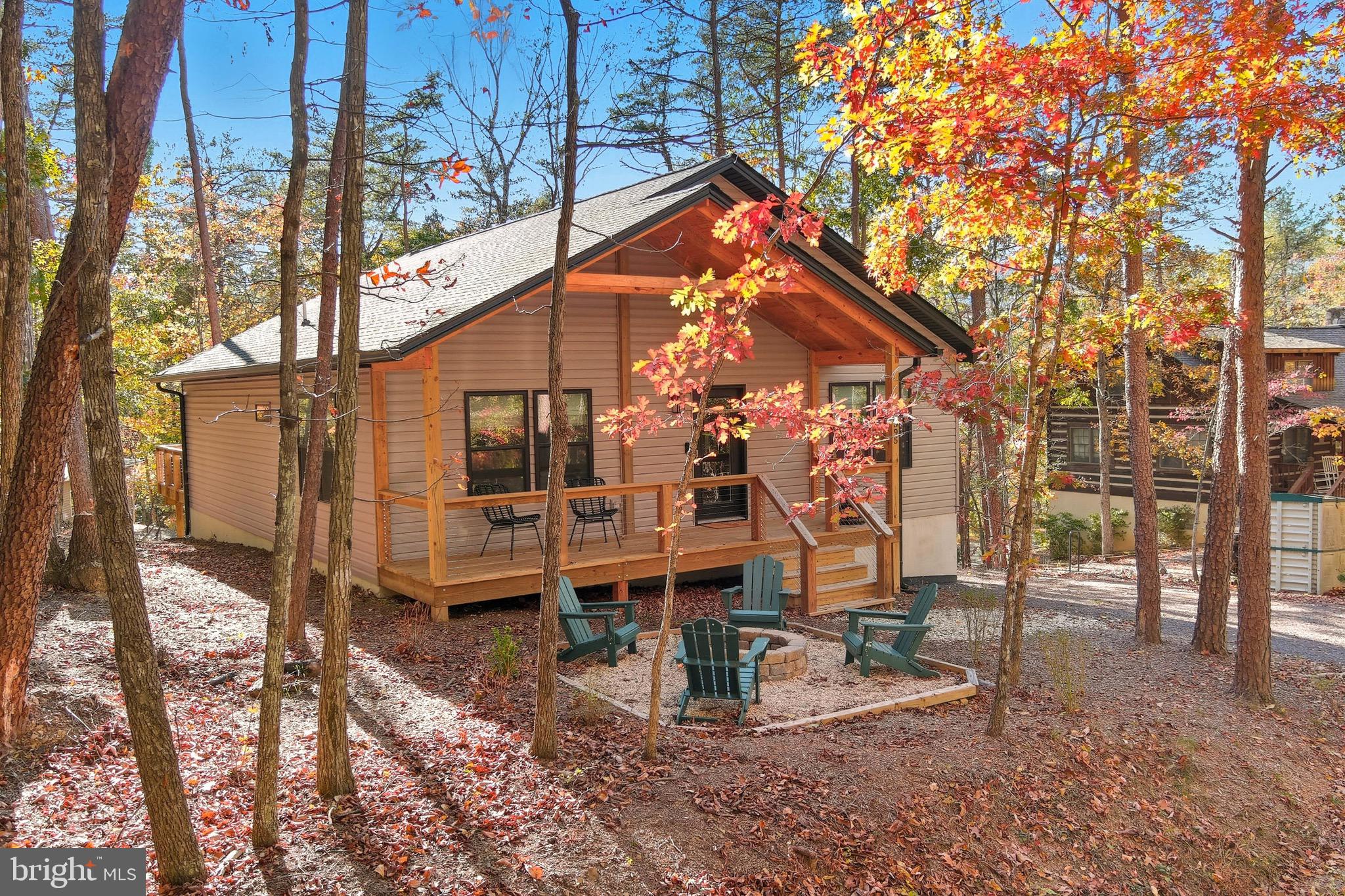 395 Deloris Road Mount Jackson, VA 22842 - Photo 3 of 48 a view of a house with a yard and wooden fence