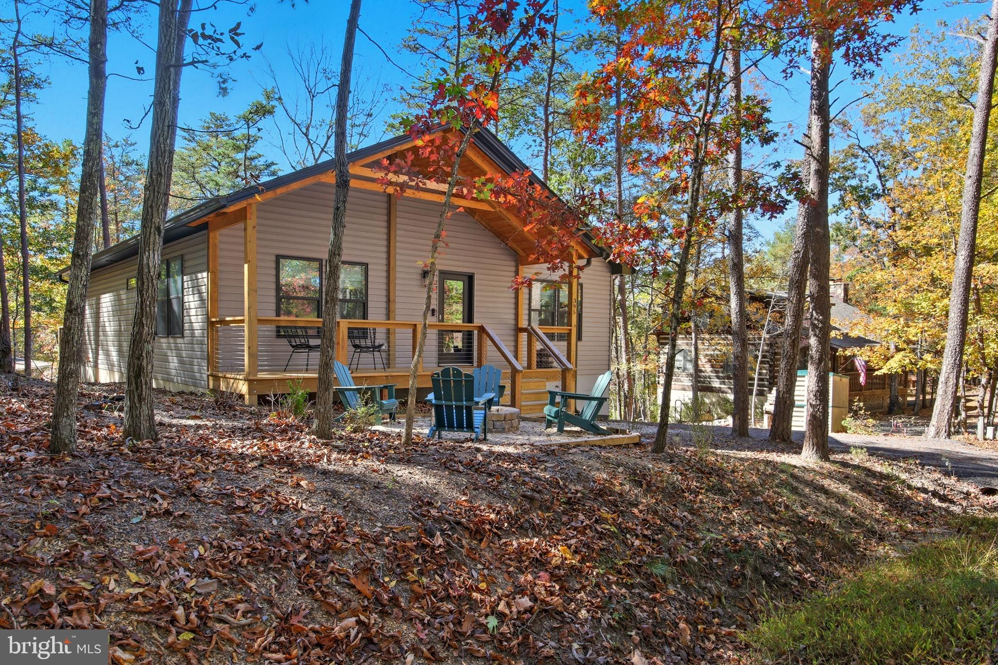 395 Deloris Road Mount Jackson, VA 22842 - Photo 36 of 48 a view of a house with a yard