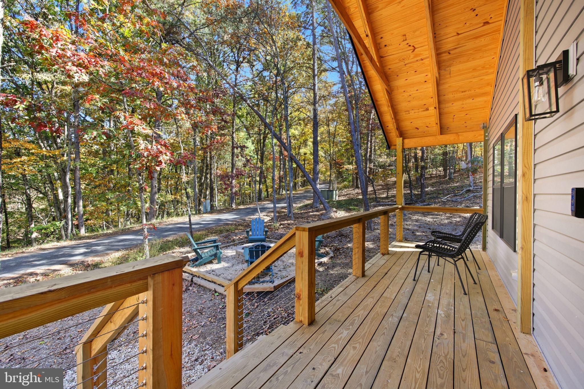 395 Deloris Road Mount Jackson, VA 22842 - Photo 38 of 48 a view of balcony with wooden floor and seating space