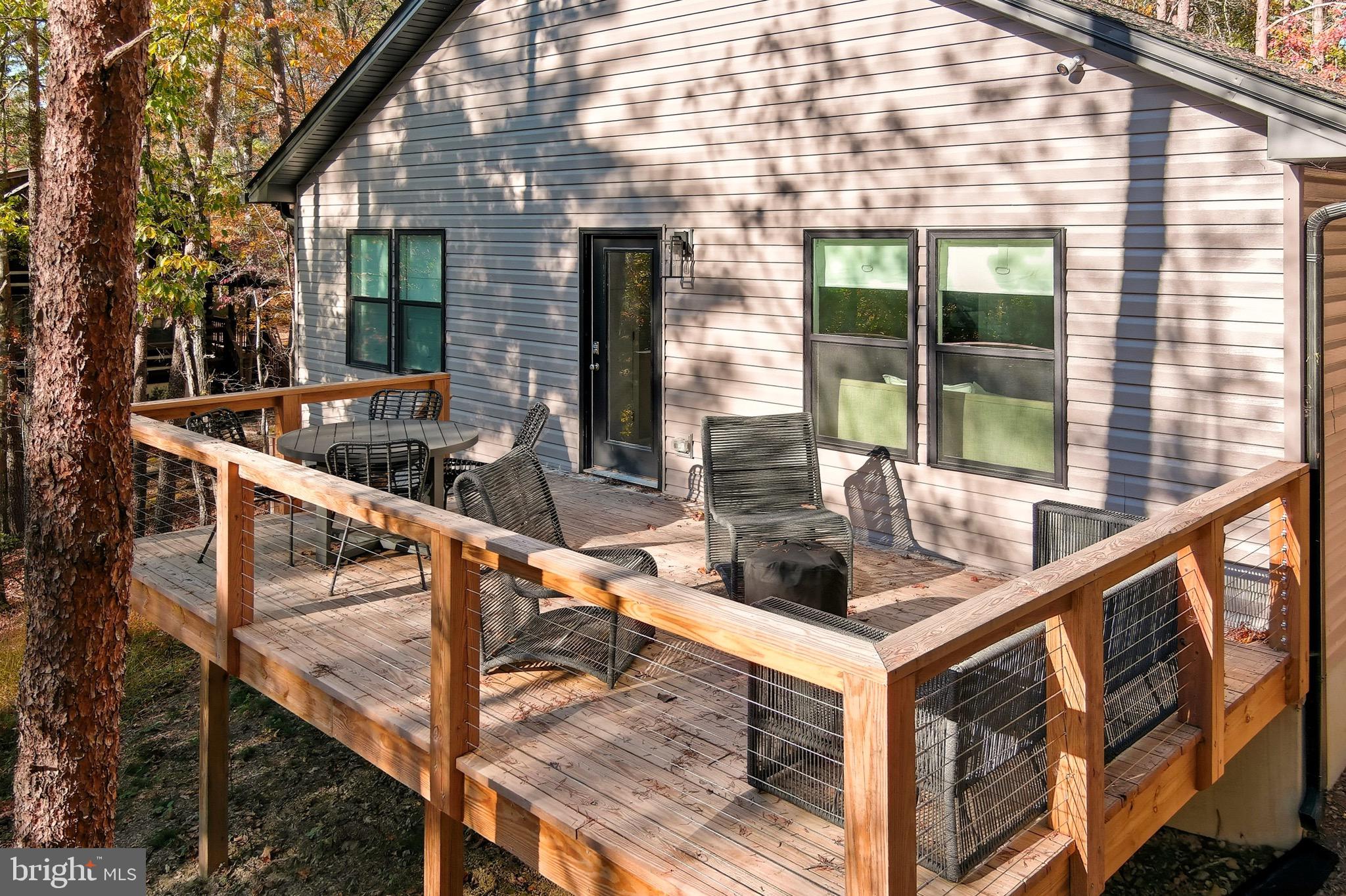 395 Deloris Road Mount Jackson, VA 22842 - Photo 4 of 48 a view of swimming pool from a balcony