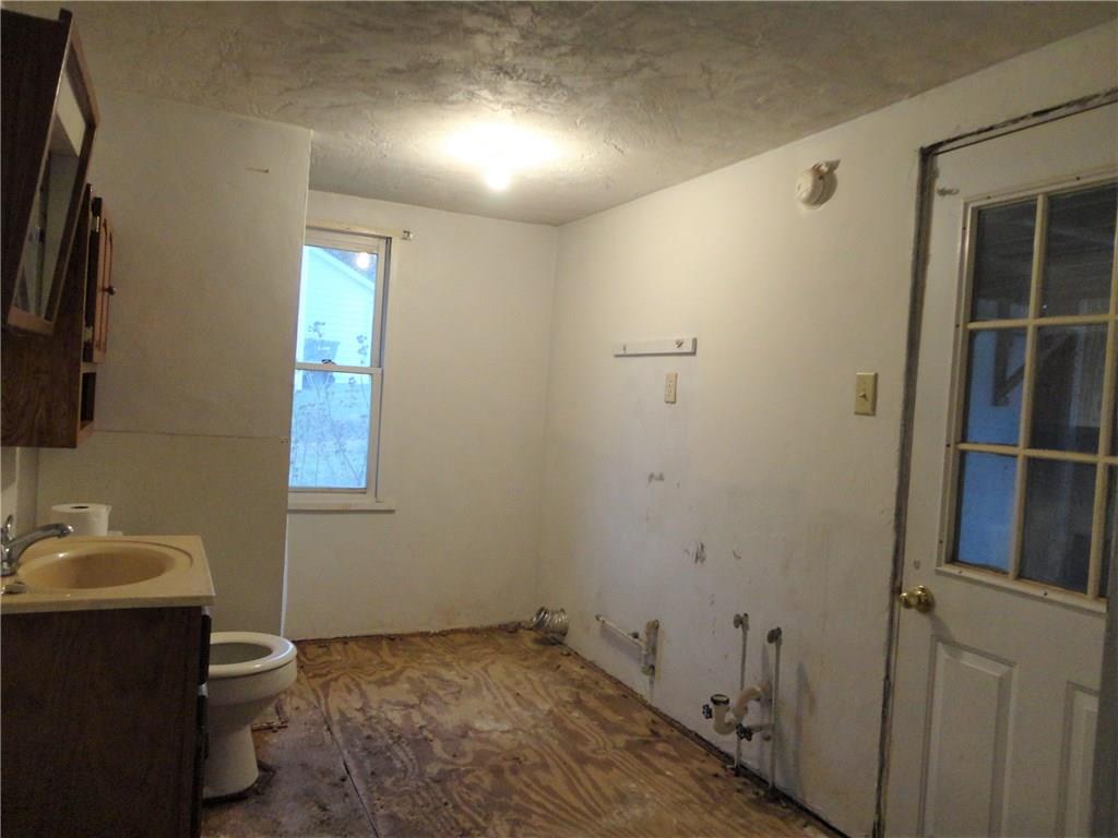 625 Spring Street Mars, PA 16046 - Photo 14 of 21 1st floor full bathroom/laundry room. Door leads to back porch area.