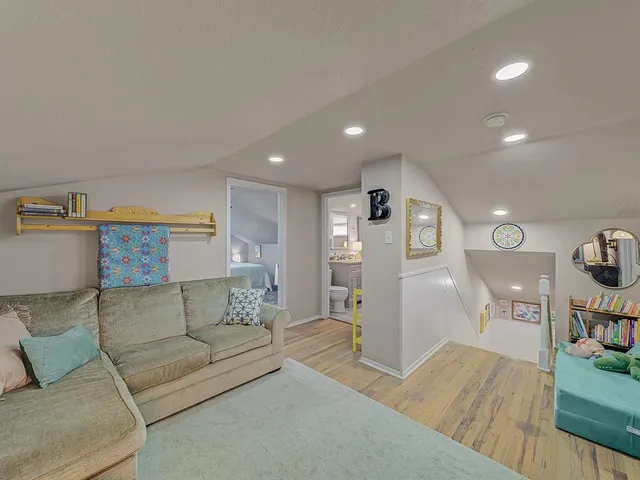 a living room with furniture and a couch