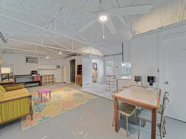 a outdoor space with lots of furniture and clutter