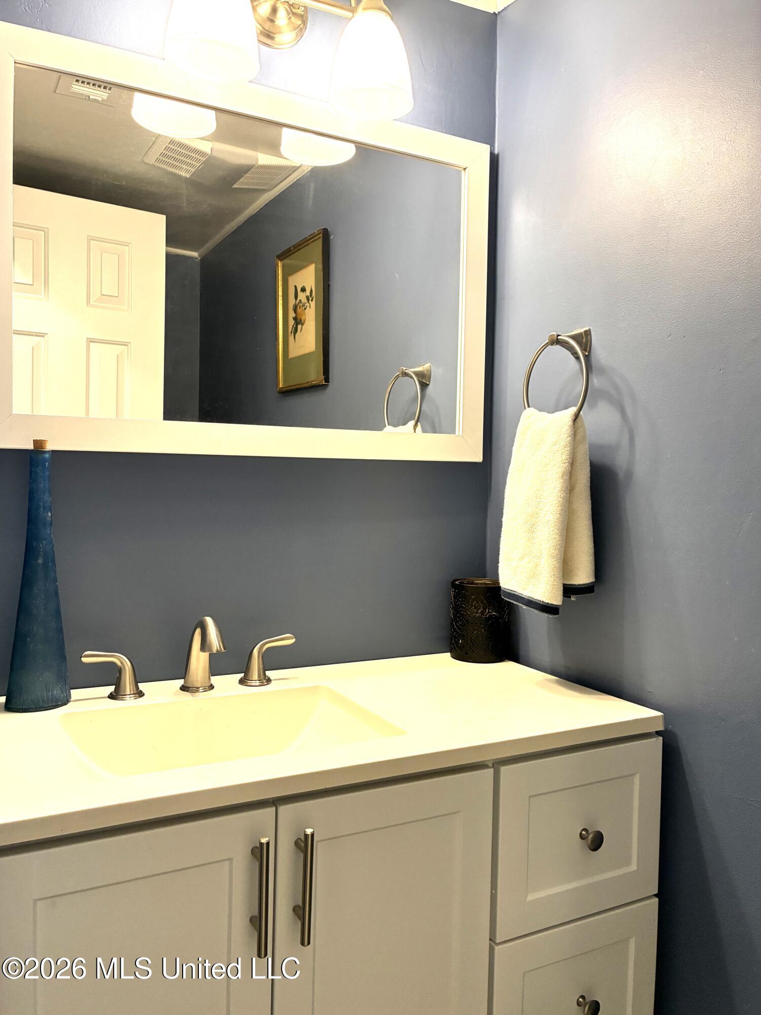 222 Highpoint Drive Diamondhead, MS 39525 - Photo 11 of 32 222 half bath