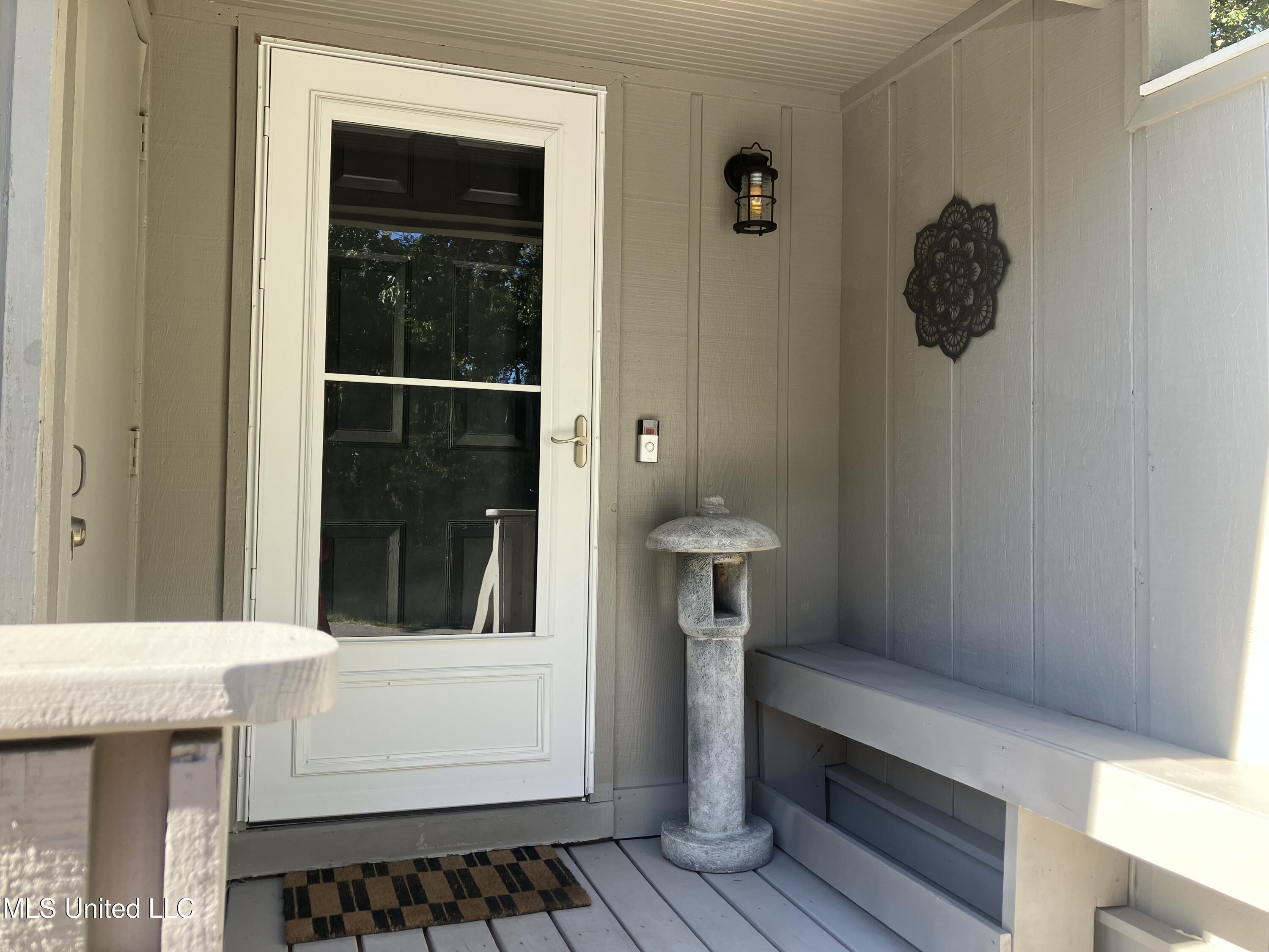 222 Highpoint Drive Diamondhead, MS 39525 - Photo 2 of 32 IMG_7834