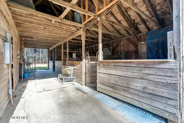 a view of a chair and table in the patio