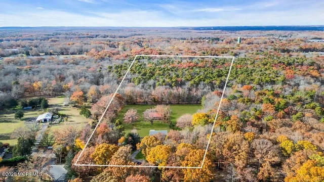an aerial view of residential house with outdoor space