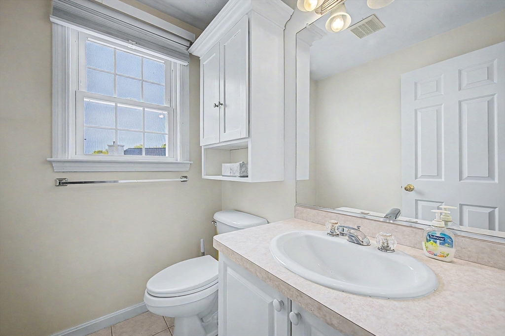 3 Oak View Terrace, Unit 3 Franklin, MA 02038 - Photo 11 of 38 a bathroom with a toilet sink and mirror