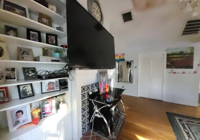 a view of storage and utility room with washer and dryer