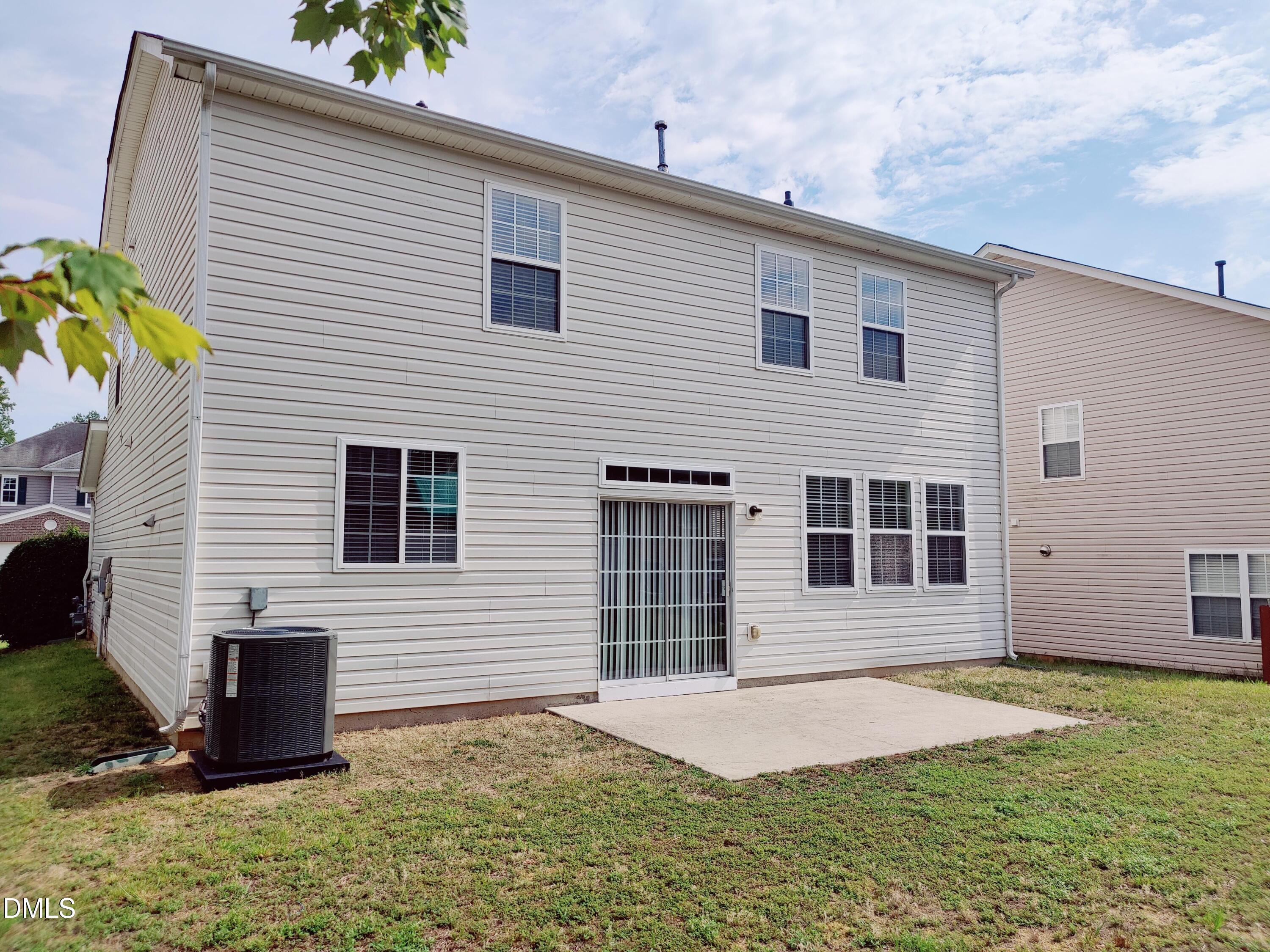 4011 Oatgrass Lane Raleigh, NC 27604 - Photo 20 of 21 a front view of a house with a yard