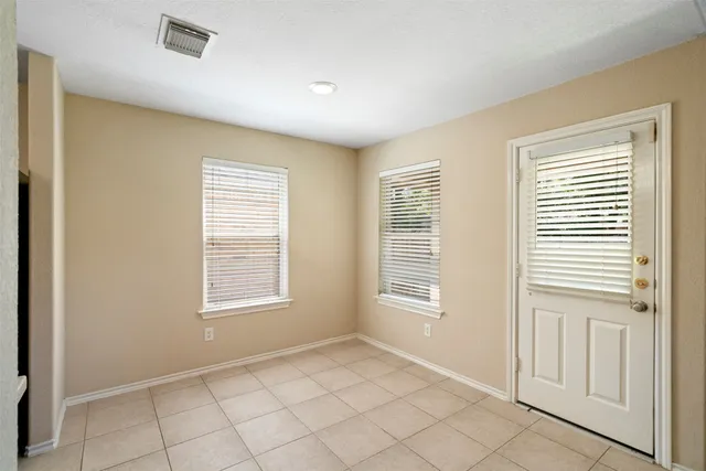 an empty room with windows