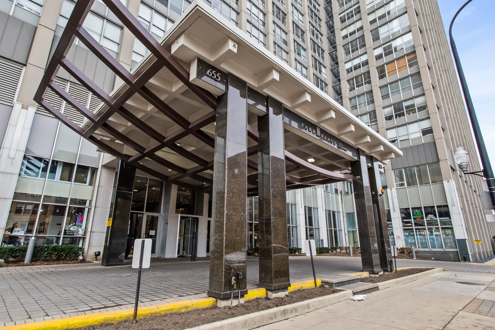 Undisclosed Address Chicago, IL 60613 - Photo 1 of 16 front view of a building