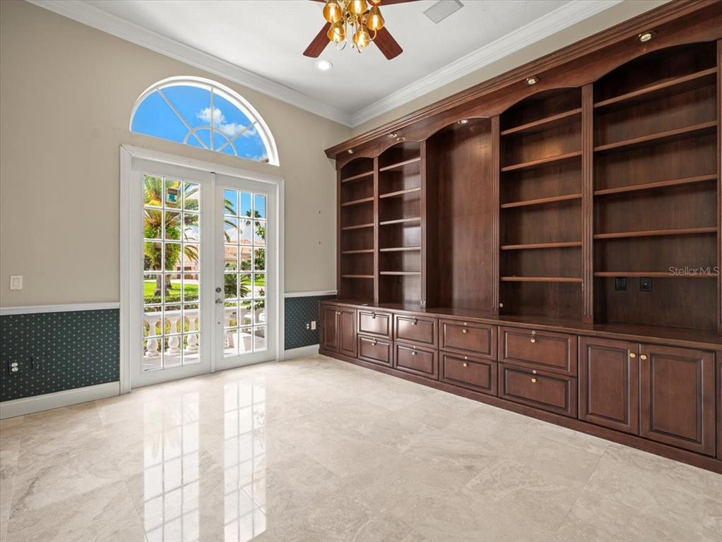 4529 Cheval Boulevard Lutz, FL 33558 - Photo 19 of 83 a view of an empty room with furniture and a window