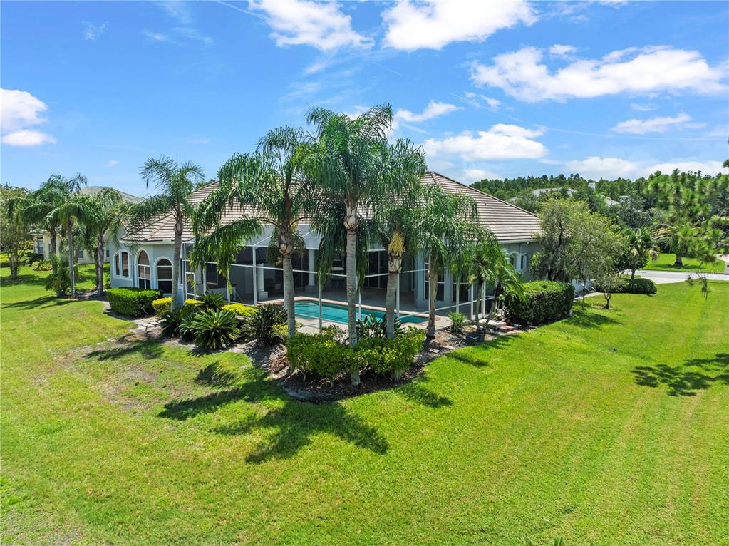 4529 Cheval Boulevard Lutz, FL 33558 - Photo 4 of 83 a view of a house with a big yard