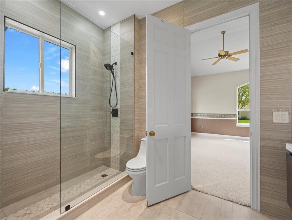 4529 Cheval Boulevard Lutz, FL 33558 - Photo 48 of 83 a bathroom with a shower