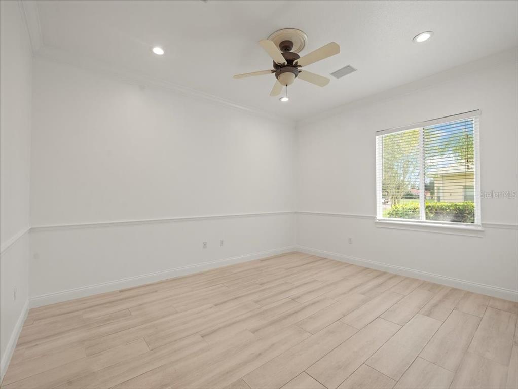 4529 Cheval Boulevard Lutz, FL 33558 - Photo 54 of 83 an empty room with a empty space and windows