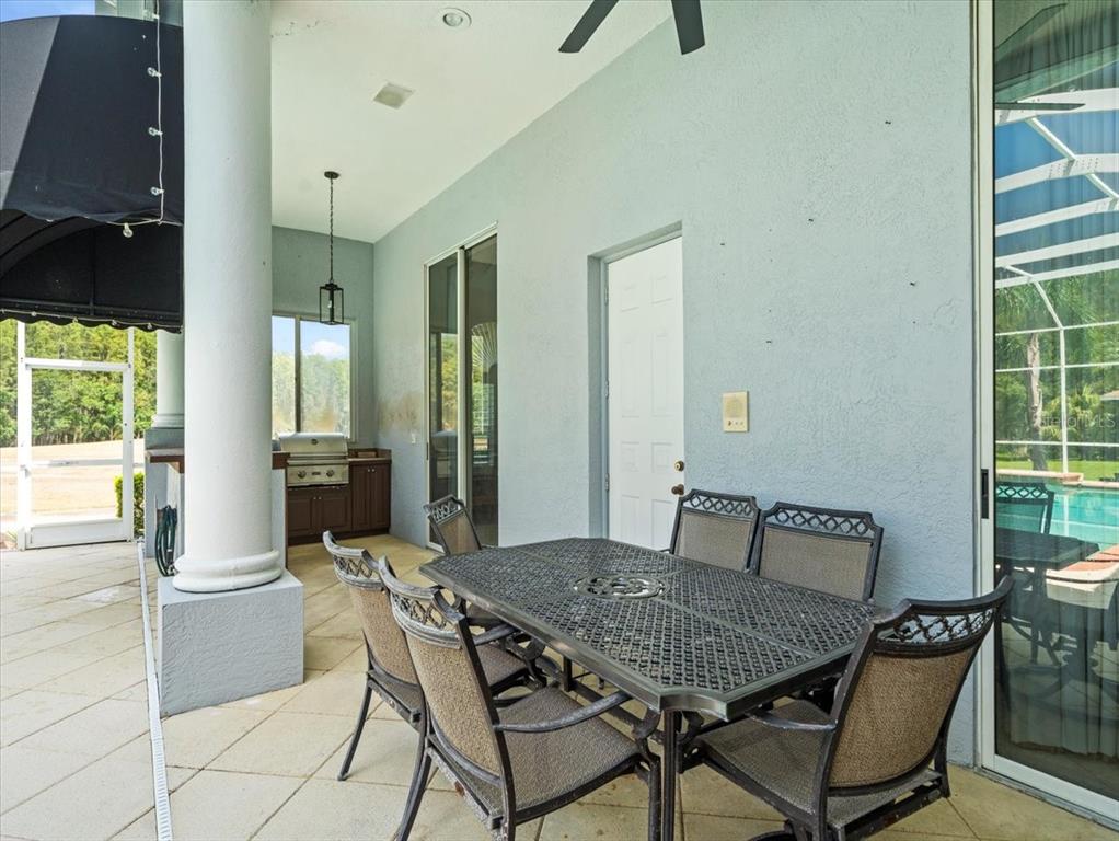 4529 Cheval Boulevard Lutz, FL 33558 - Photo 71 of 83 a view of a dining room with furniture