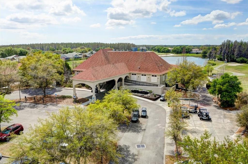4529 Cheval Boulevard Lutz, FL 33558 - Photo 83 of 83 an aerial view of residential houses with outdoor space and swimming pool