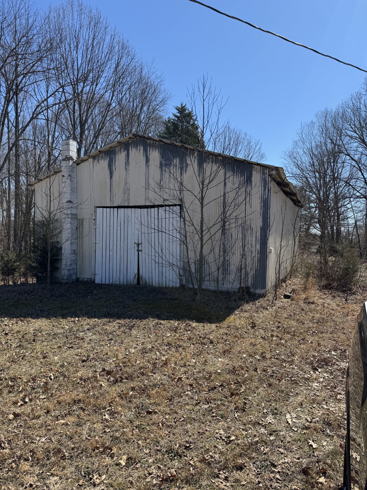 1475 Holland Road Lafayette, TN 37083 - Photo 4 of 12 a view of a house with a wooden fence