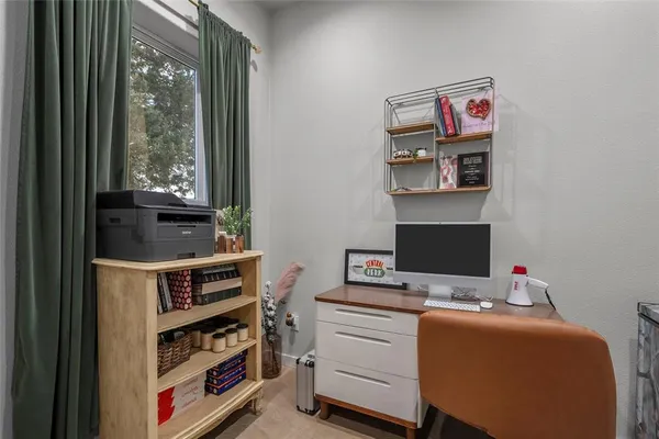 a room with furniture and a window