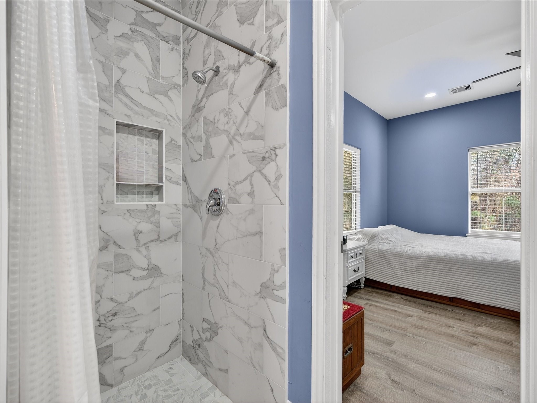 1833 County Road 3556 Cleveland, TX 77327 - Photo 11 of 30 a bedroom with a bed and a window