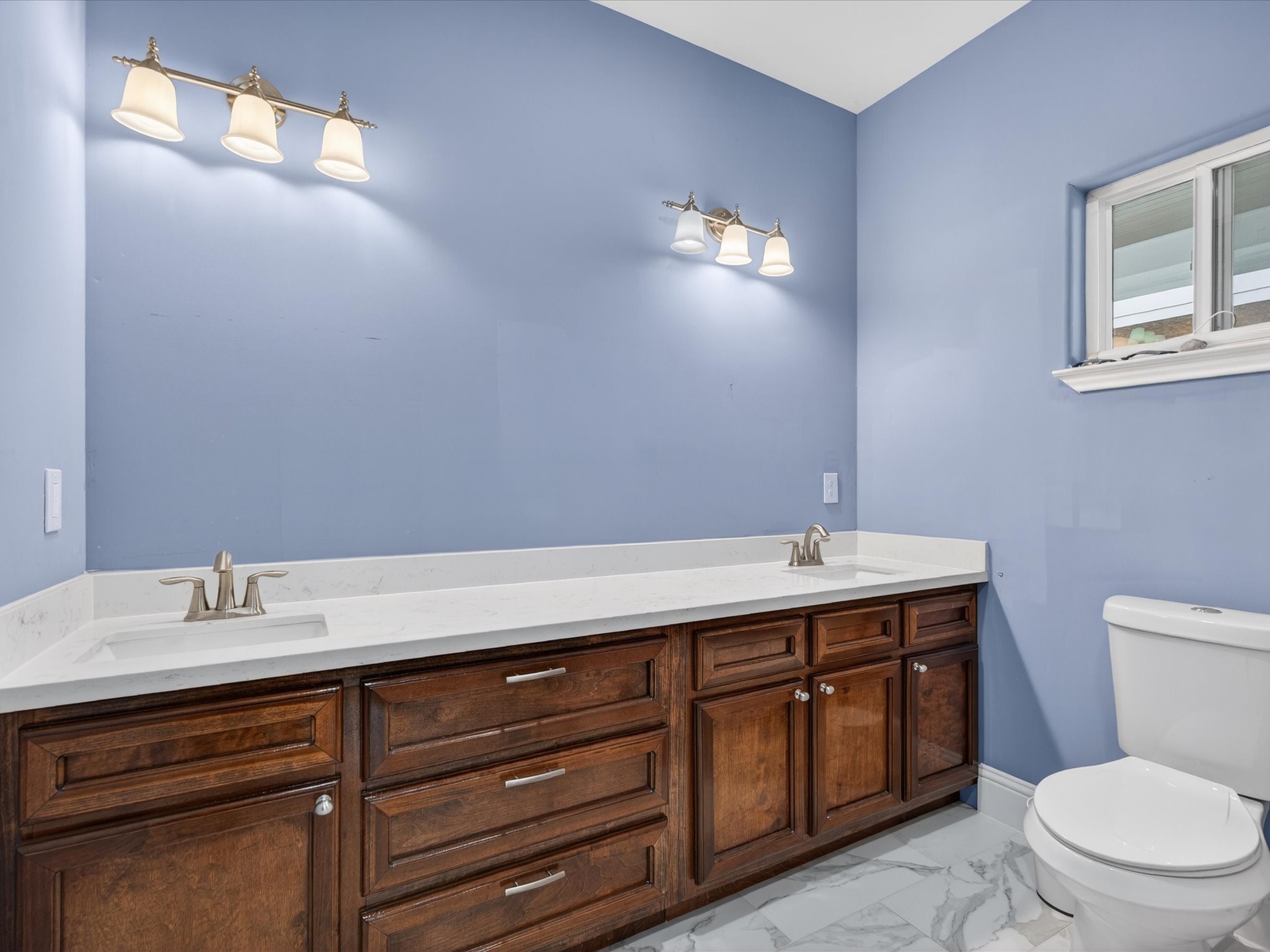 1833 County Road 3556 Cleveland, TX 77327 - Photo 12 of 30 a bathroom with a toilet sink and mirror
