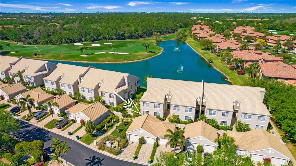 5705 Heron Lane, Unit 801 Naples, FL 34110 - Photo 2 of 32 an aerial view of a house with a garden