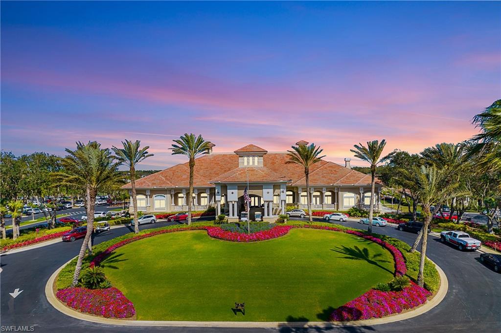 5705 Heron Lane, Unit 801 Naples, FL 34110 - Photo 23 of 32 a swimming pool with outdoor seating and yard