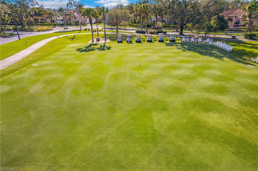 5705 Heron Lane, Unit 801 Naples, FL 34110 - Photo 32 of 32 a view of a swimming pool with an ocean view