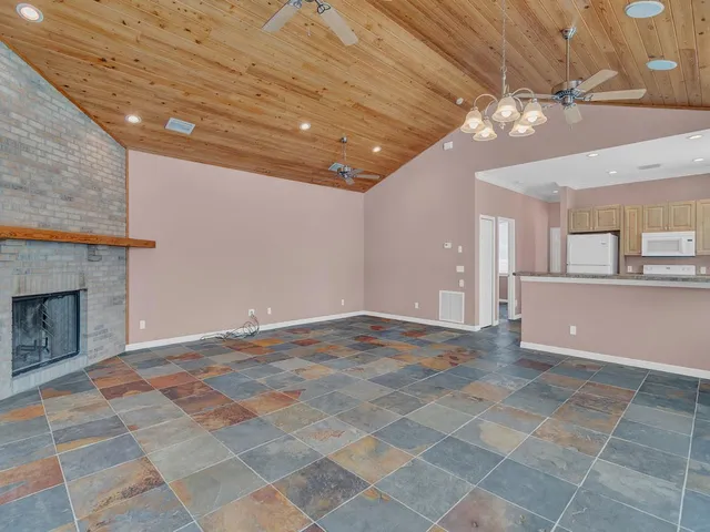 a view of a livingroom with a fireplace