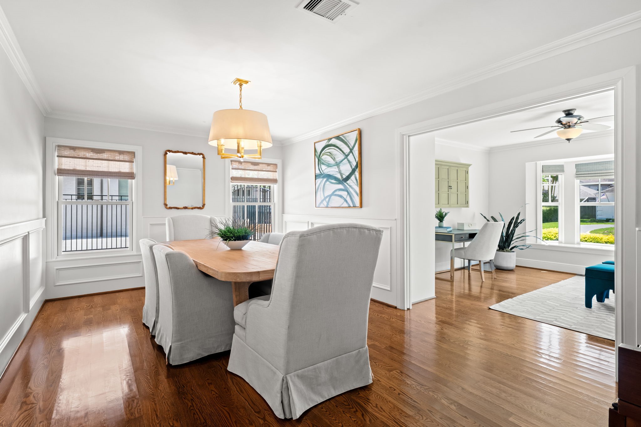 13614 Apple Tree Road Houston, TX 77079 - Photo 12 of 38 a living room with dining table and wooden floor