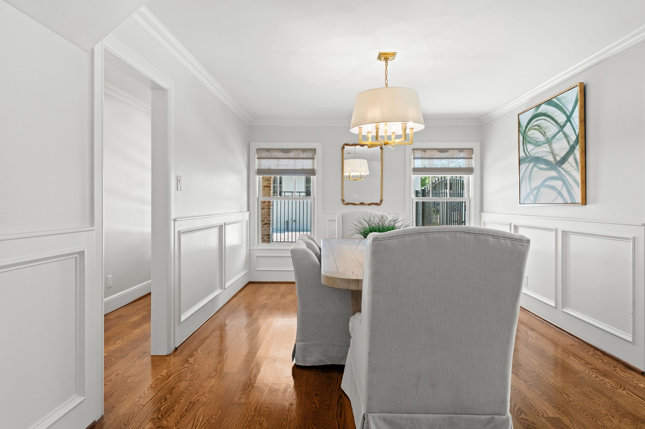 13614 Apple Tree Road Houston, TX 77079 - Photo 13 of 38 a living room with furniture a large window and wooden floor