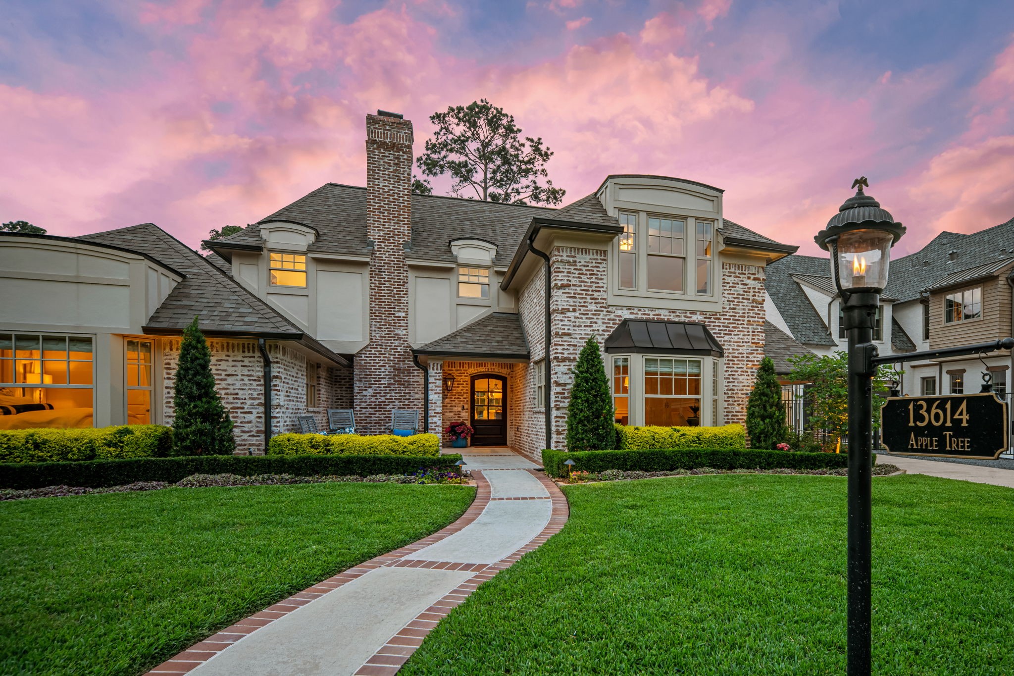 13614 Apple Tree Road Houston, TX 77079 - Photo 2 of 38 a front view of a house with a yard