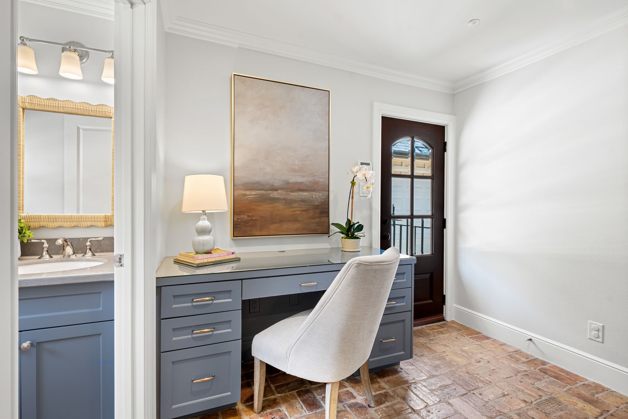 13614 Apple Tree Road Houston, TX 77079 - Photo 22 of 38 a view of a workspace room with wooden floor windows and cabinet