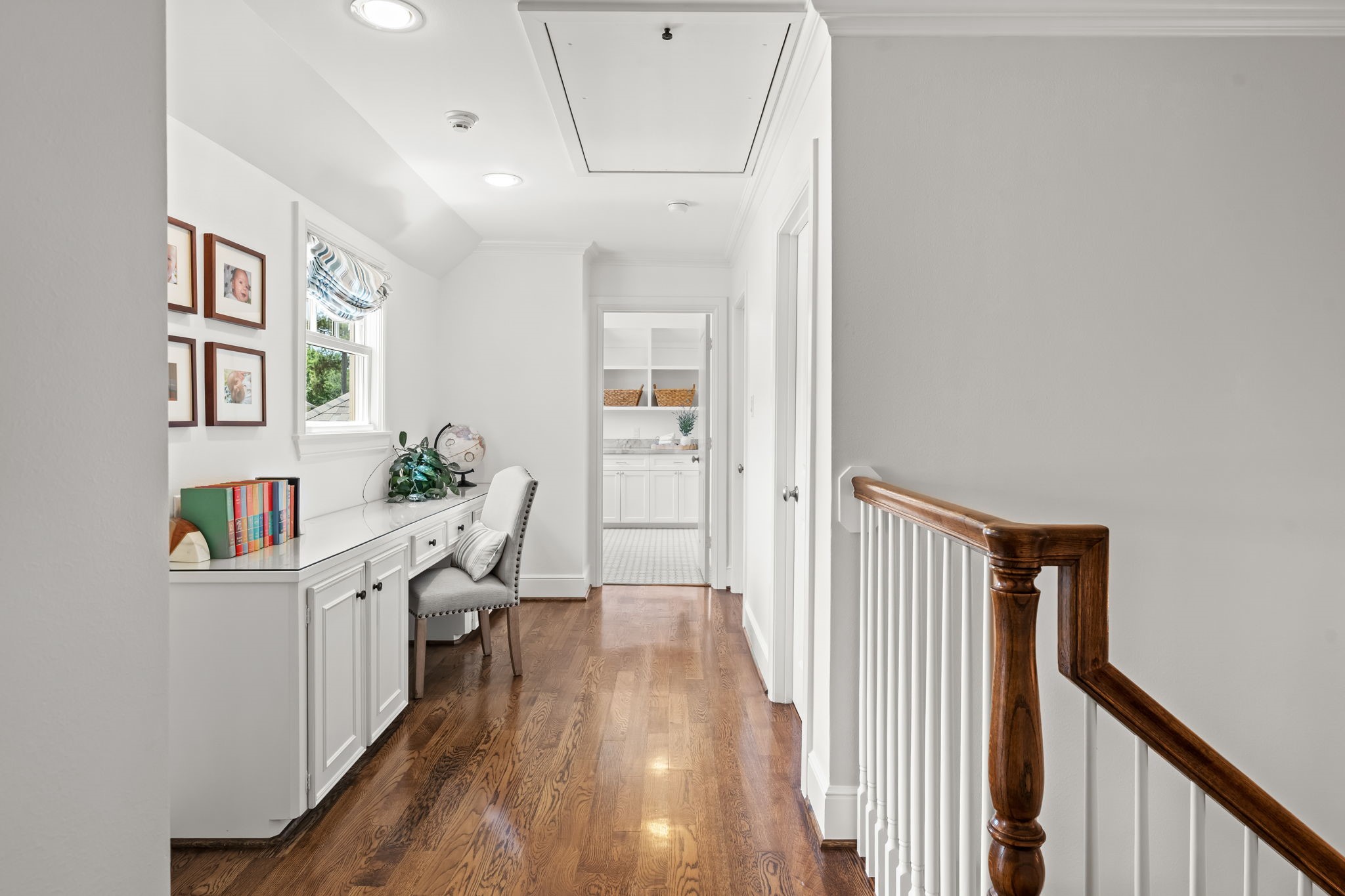 13614 Apple Tree Road Houston, TX 77079 - Photo 24 of 38 a view of a hallway with wooden floor and a living room