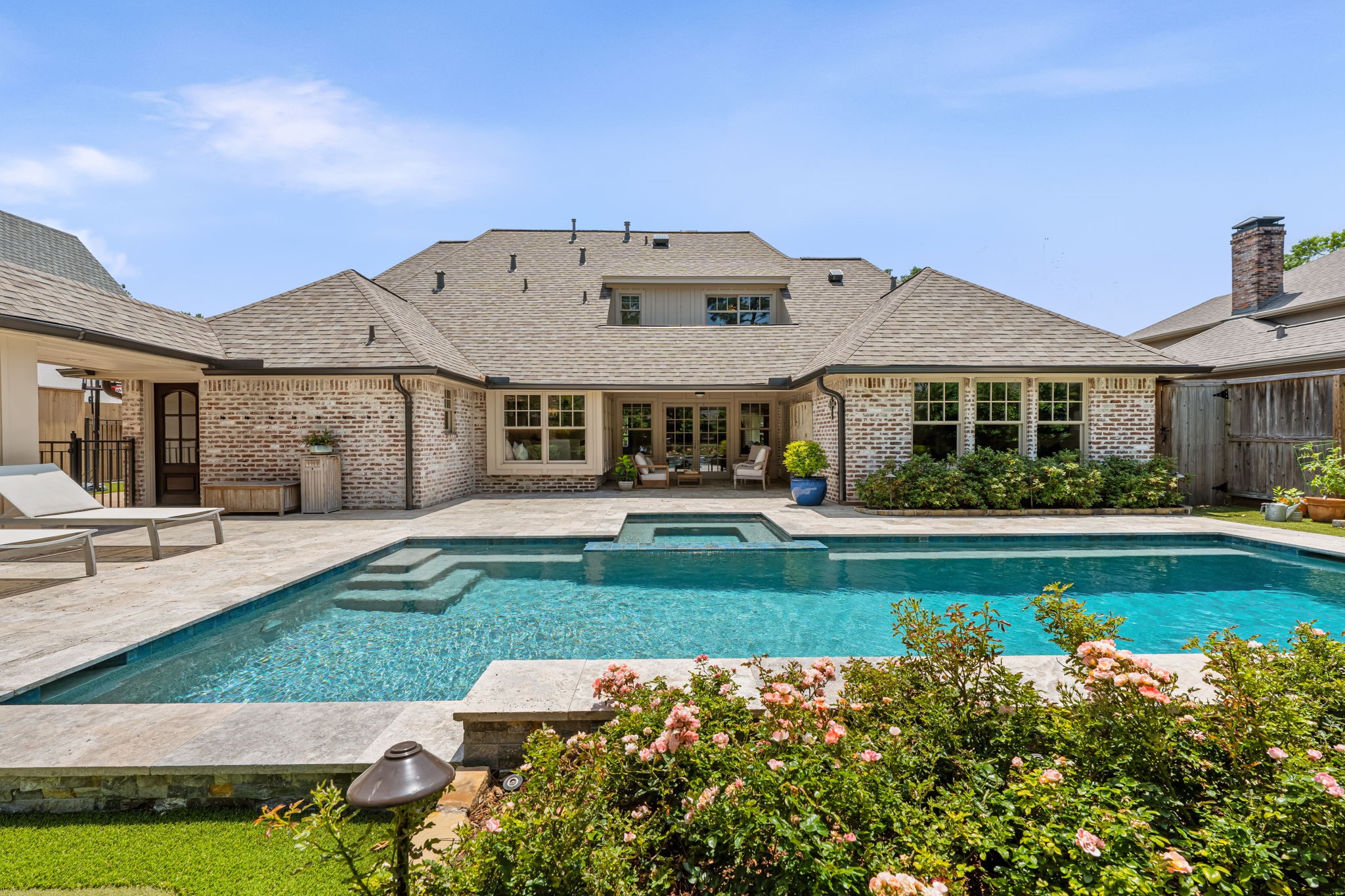 13614 Apple Tree Road Houston, TX 77079 - Photo 31 of 38 a front view of a house with swimming pool having outdoor seating