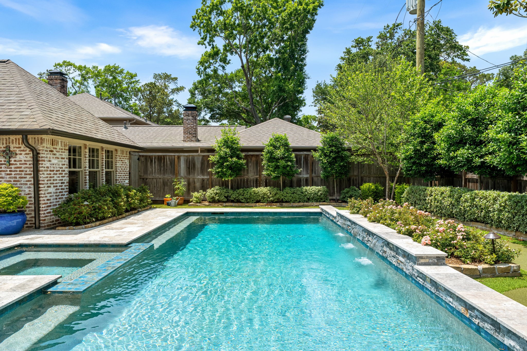 13614 Apple Tree Road Houston, TX 77079 - Photo 35 of 38 a view of a house with swimming pool and a garden