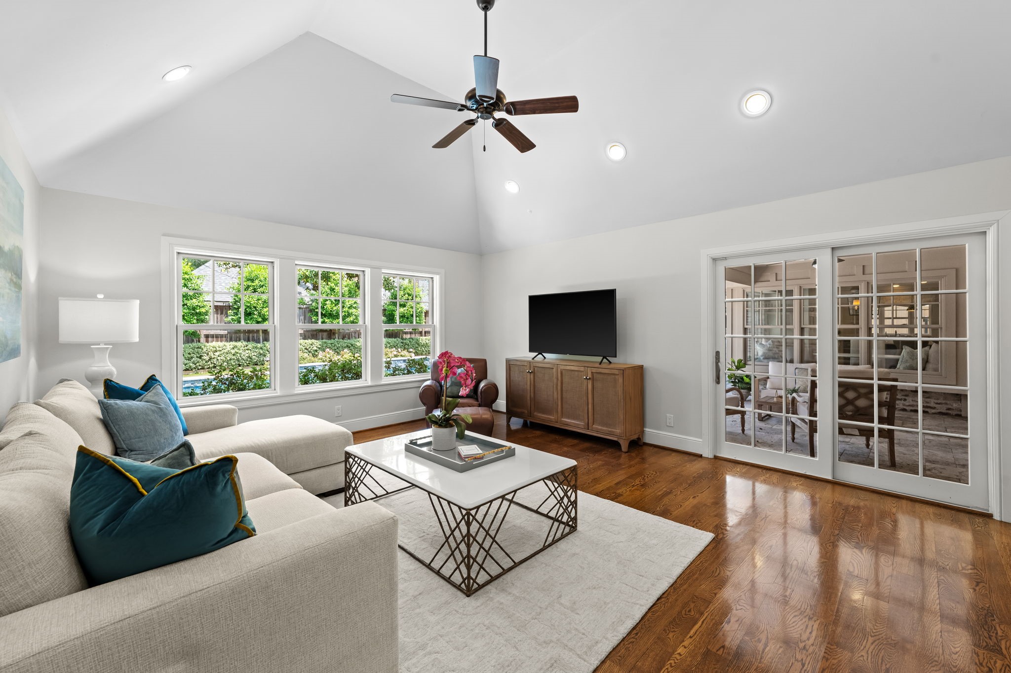 13614 Apple Tree Road Houston, TX 77079 - Photo 7 of 38 a living room with furniture and a flat screen tv