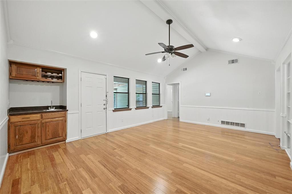 1928 Meandering Way McKinney, TX 75071 - Photo 10 of 22 a view of an empty room with a window and cabinet