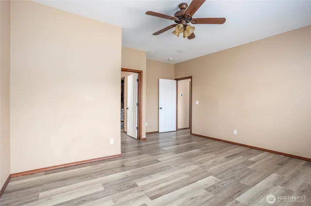 a view of an empty room and window