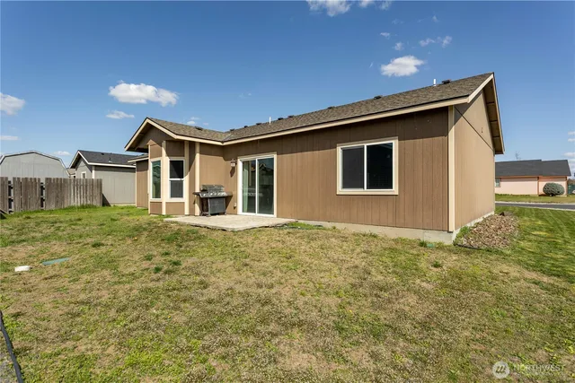 a front view of a house with yard