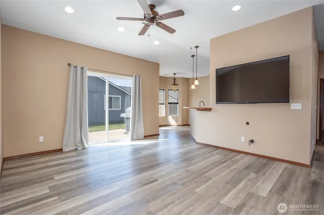 a view of a livingroom with a flat screen tv