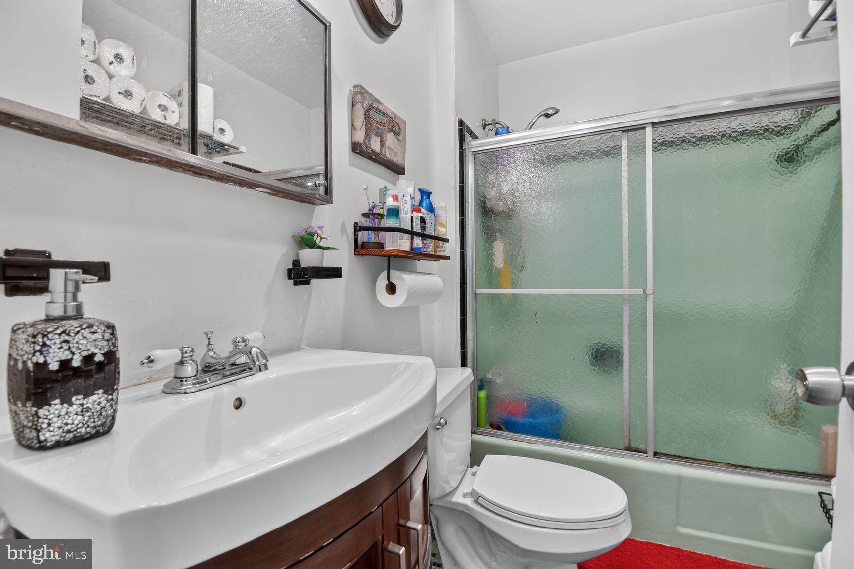 1207 Oakview Drive Silver Spring, MD 20903 - Photo 10 of 25 Charming bathroom with modern touches.