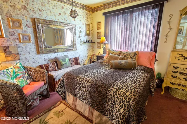 a white toilet sitting next to a shower curtain