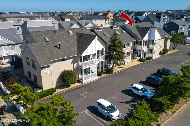 a front view of a house with a street