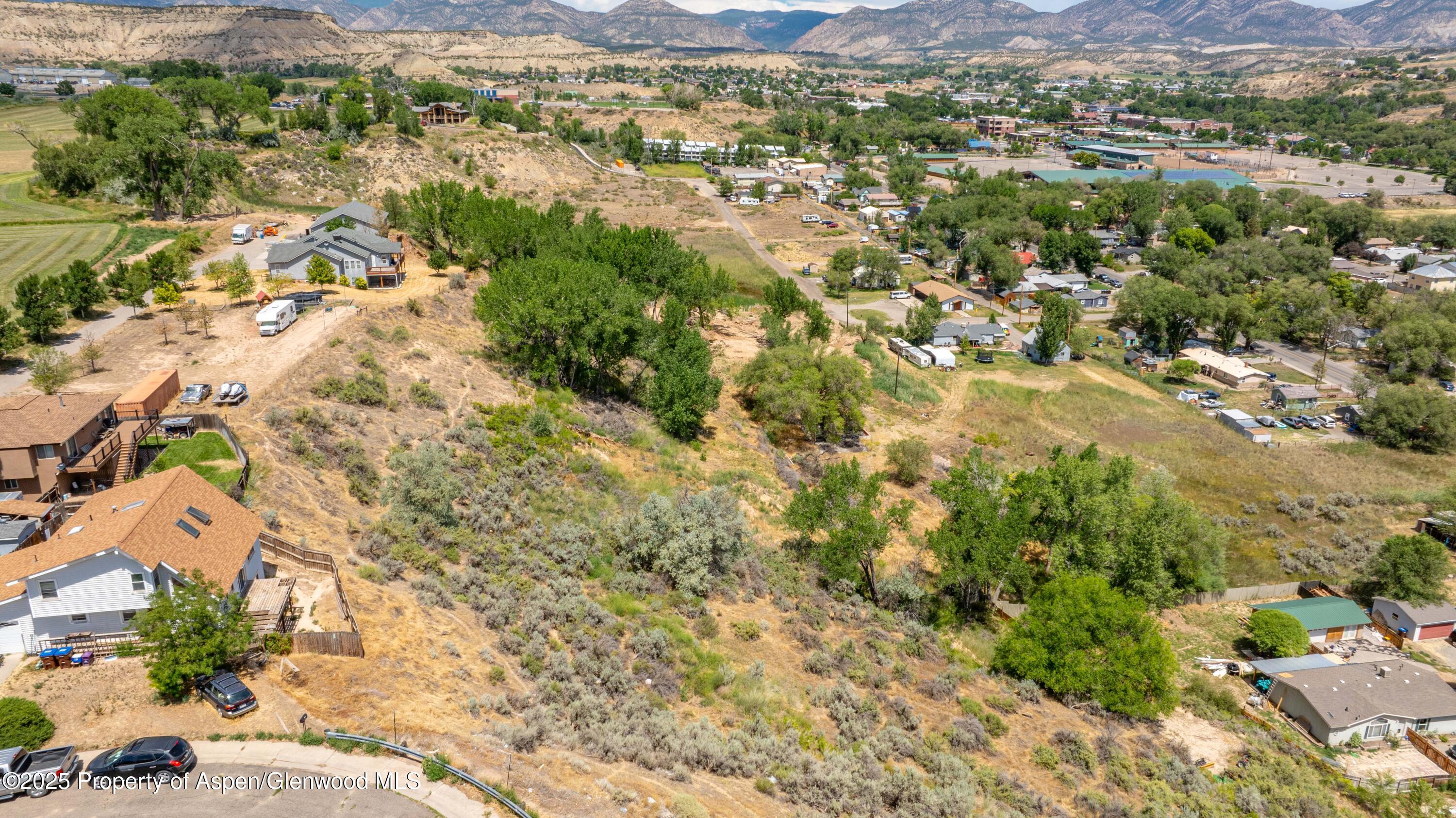 Tbd Stillwell Avenue Rifle, CO 81650 - Photo 11 of 14 an aerial view of residential houses with outdoor space and trees