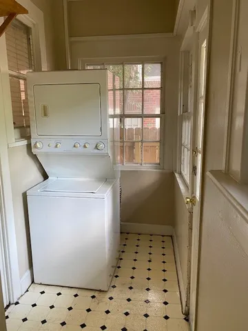 a view of a backyard with sitting area