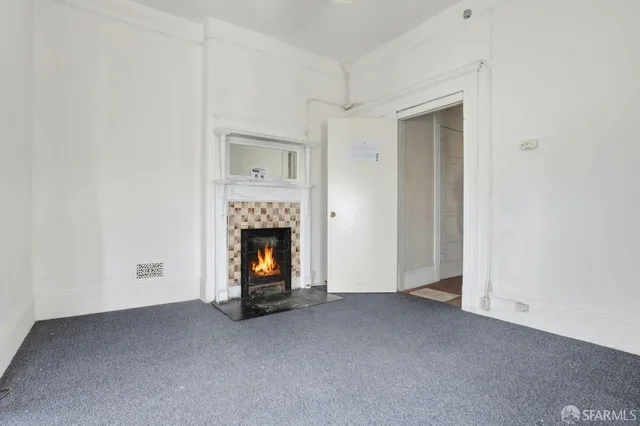 a view of a livingroom with a fireplace