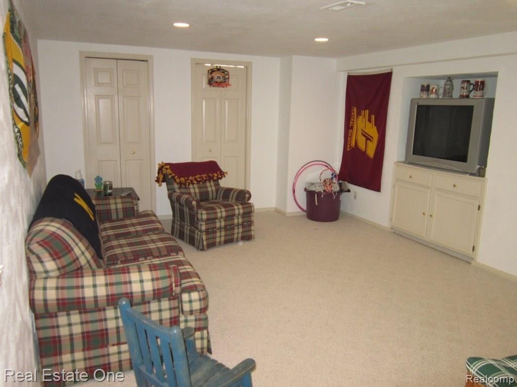 45347 Courtview Trail Novi, MI 48375 - Photo 26 of 31 finished basement.JPG